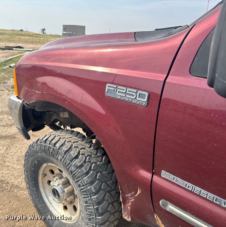 image for item ER2260 2000 Ford F250 Super Duty SuperCab flatbed pickup truck