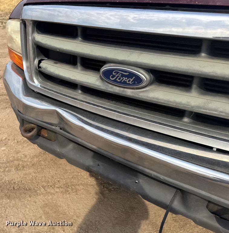 image for item ER2260 2000 Ford F250 Super Duty SuperCab flatbed pickup truck