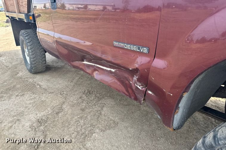 image for item ER2260 2000 Ford F250 Super Duty SuperCab flatbed pickup truck