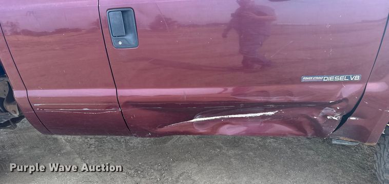 image for item ER2260 2000 Ford F250 Super Duty SuperCab flatbed pickup truck