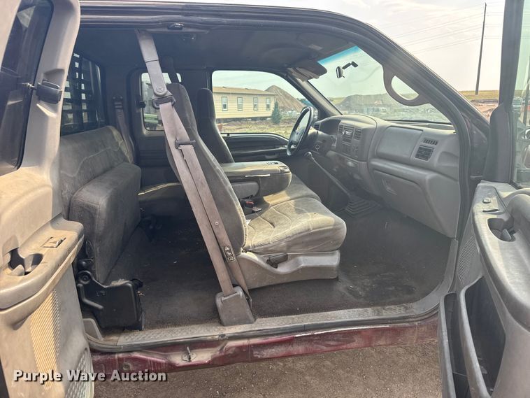 image for item ER2260 2000 Ford F250 Super Duty SuperCab flatbed pickup truck