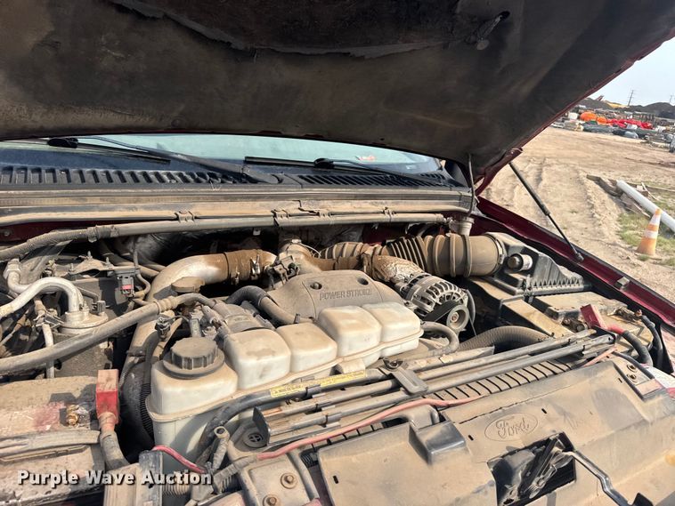 image for item ER2260 2000 Ford F250 Super Duty SuperCab flatbed pickup truck