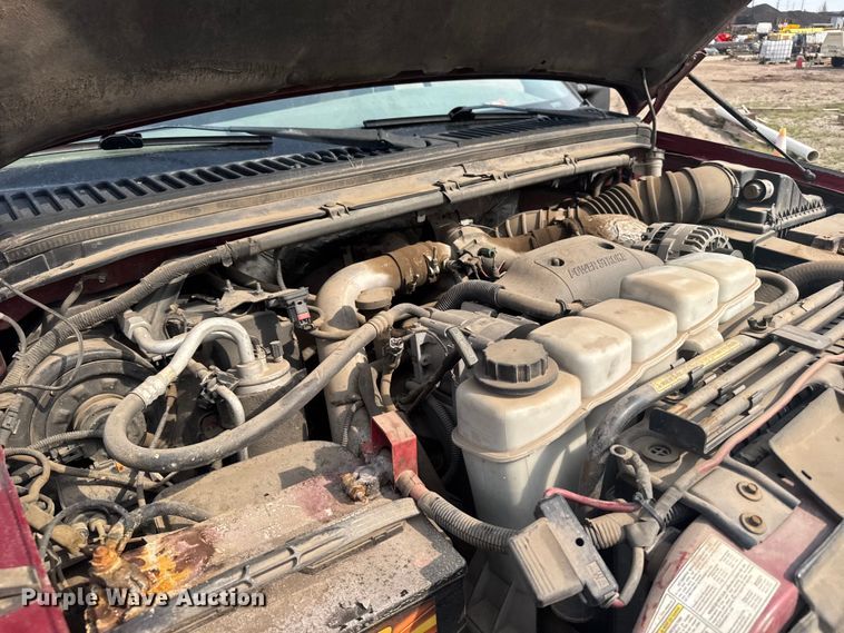 image for item ER2260 2000 Ford F250 Super Duty SuperCab flatbed pickup truck