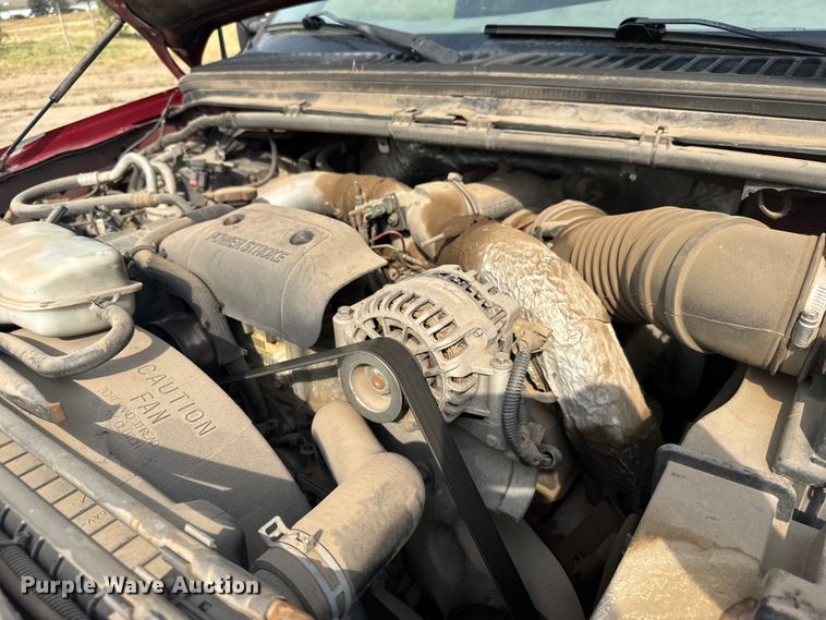 image for item ER2260 2000 Ford F250 Super Duty SuperCab flatbed pickup truck