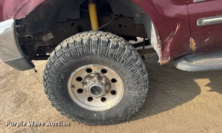 image for item ER2260 2000 Ford F250 Super Duty SuperCab flatbed pickup truck