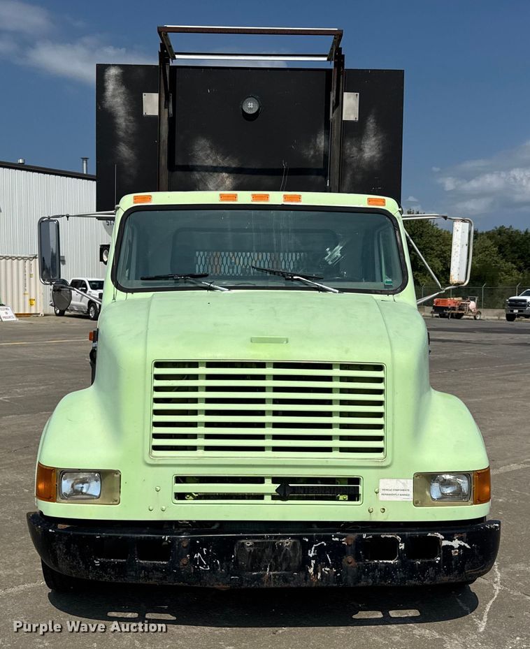 image for item DW6504 1999 International 4700  flatbed truck with crash attenuator