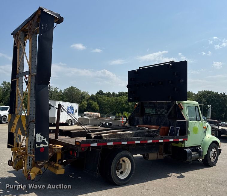 image for item DW6504 1999 International 4700  flatbed truck with crash attenuator