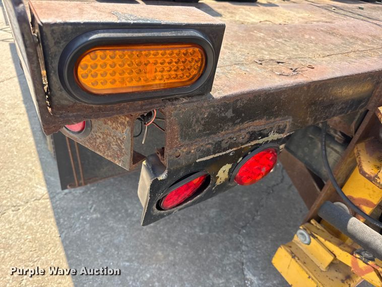 image for item DW6504 1999 International 4700  flatbed truck with crash attenuator