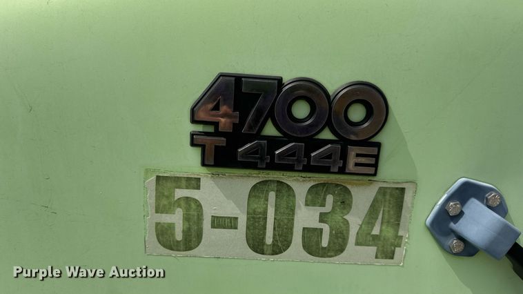 image for item DW6504 1999 International 4700  flatbed truck with crash attenuator