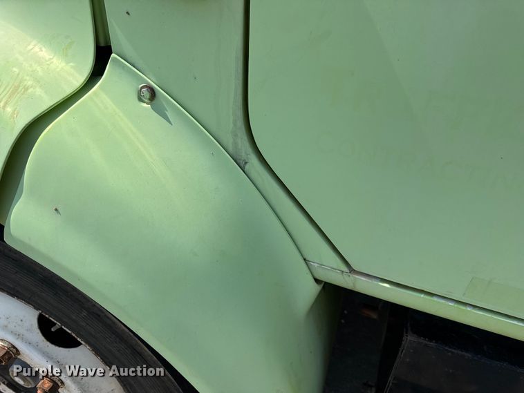 image for item DW6504 1999 International 4700  flatbed truck with crash attenuator