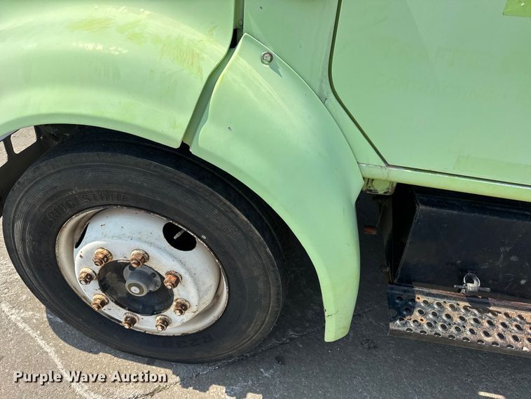 image for item DW6504 1999 International 4700  flatbed truck with crash attenuator