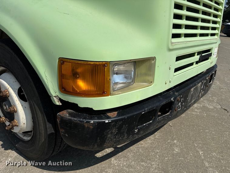 image for item DW6504 1999 International 4700  flatbed truck with crash attenuator