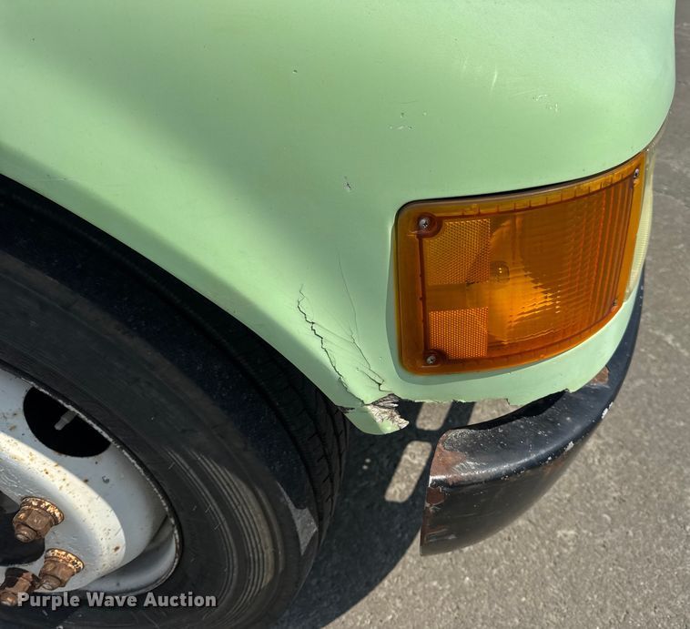 image for item DW6504 1999 International 4700  flatbed truck with crash attenuator