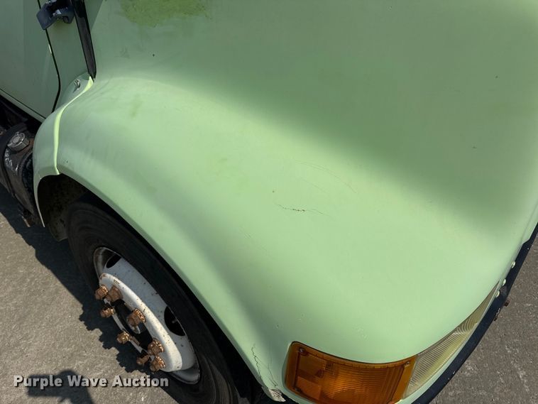 image for item DW6504 1999 International 4700  flatbed truck with crash attenuator