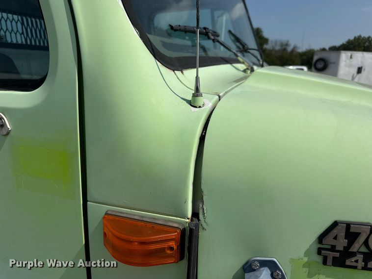 image for item DW6504 1999 International 4700  flatbed truck with crash attenuator