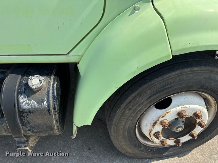 image for item DW6504 1999 International 4700  flatbed truck with crash attenuator