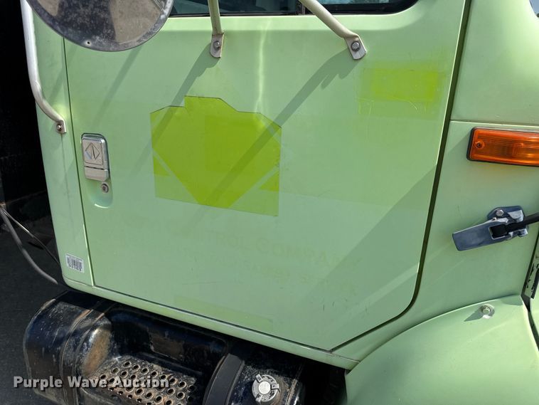 image for item DW6504 1999 International 4700  flatbed truck with crash attenuator