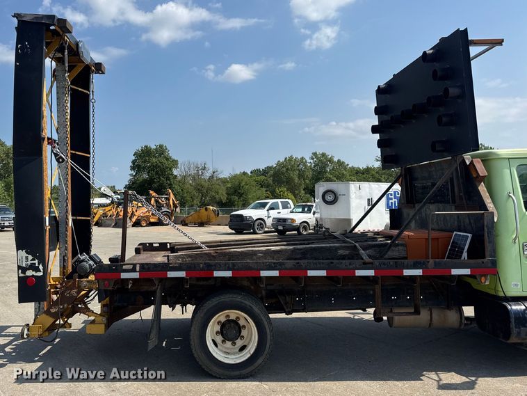 image for item DW6504 1999 International 4700  flatbed truck with crash attenuator