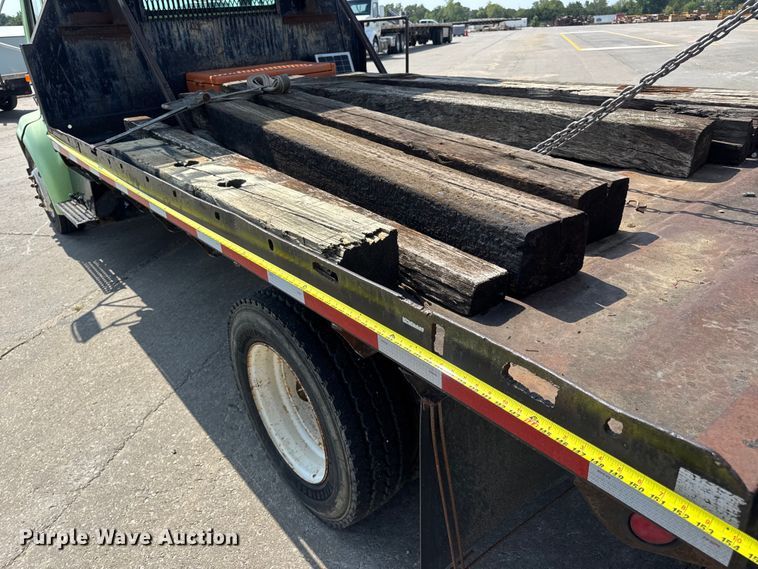 image for item DW6504 1999 International 4700  flatbed truck with crash attenuator