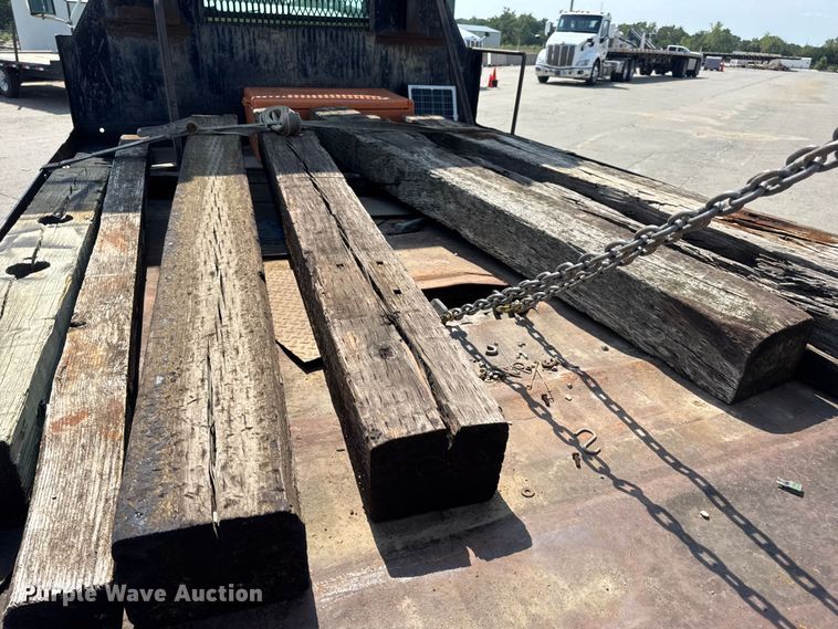 image for item DW6504 1999 International 4700  flatbed truck with crash attenuator