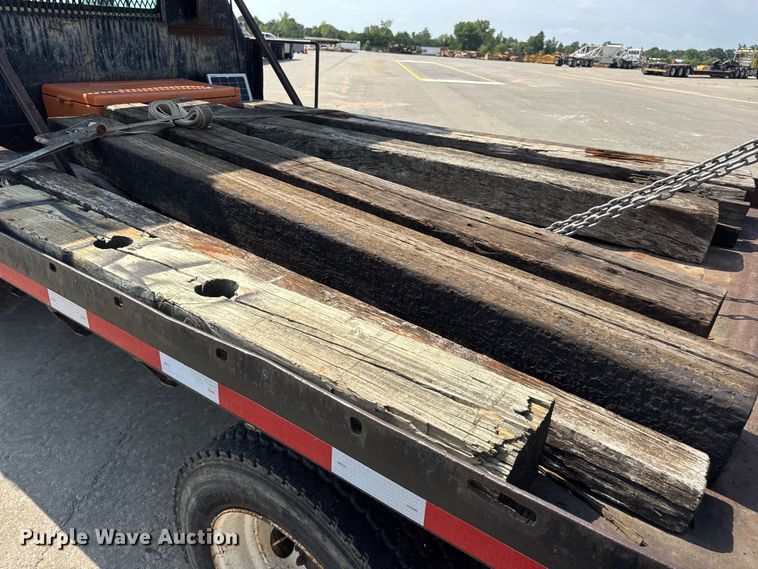 image for item DW6504 1999 International 4700  flatbed truck with crash attenuator