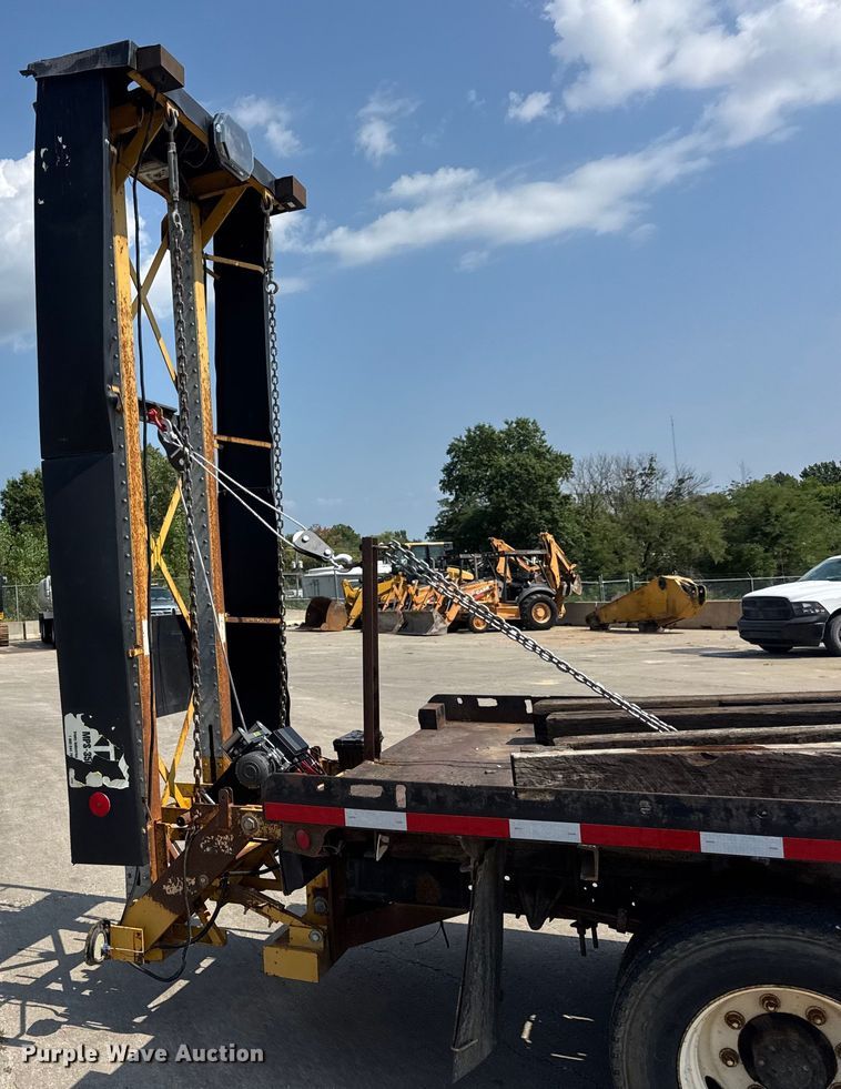 image for item DW6504 1999 International 4700  flatbed truck with crash attenuator