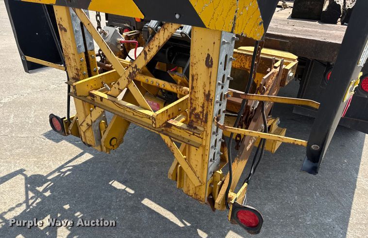 image for item DW6504 1999 International 4700  flatbed truck with crash attenuator