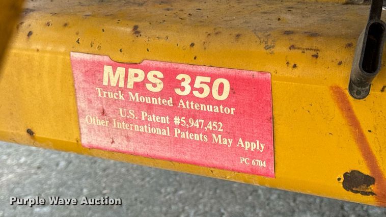 image for item DW6504 1999 International 4700  flatbed truck with crash attenuator
