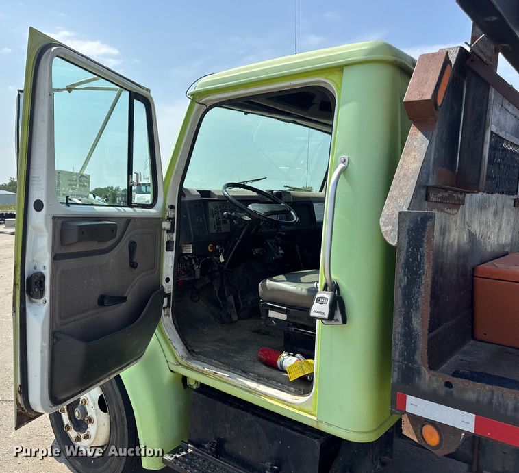 image for item DW6504 1999 International 4700  flatbed truck with crash attenuator