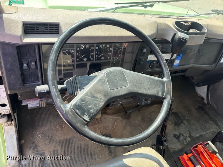 image for item DW6504 1999 International 4700  flatbed truck with crash attenuator