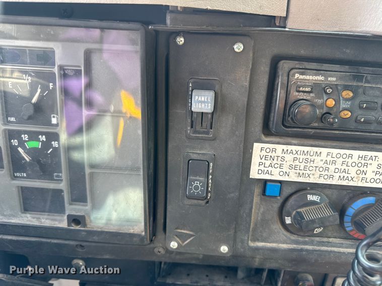 image for item DW6504 1999 International 4700  flatbed truck with crash attenuator