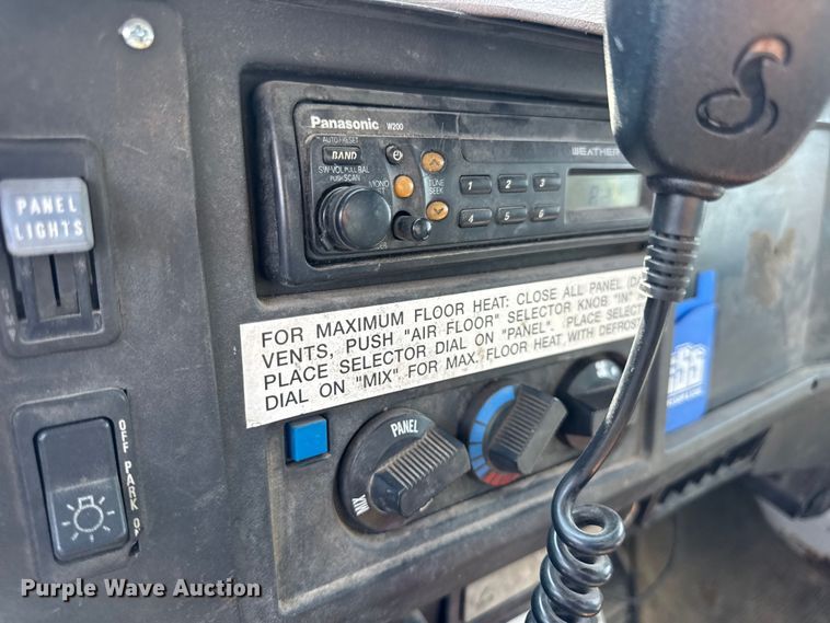 image for item DW6504 1999 International 4700  flatbed truck with crash attenuator