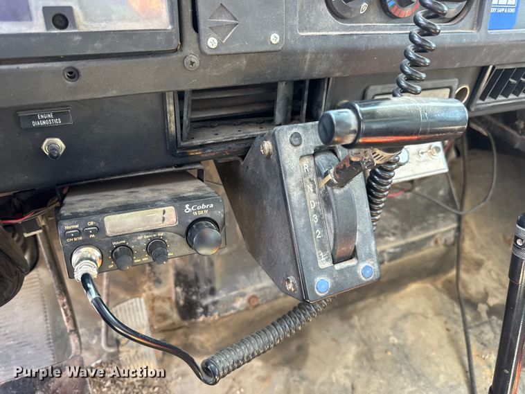 image for item DW6504 1999 International 4700  flatbed truck with crash attenuator