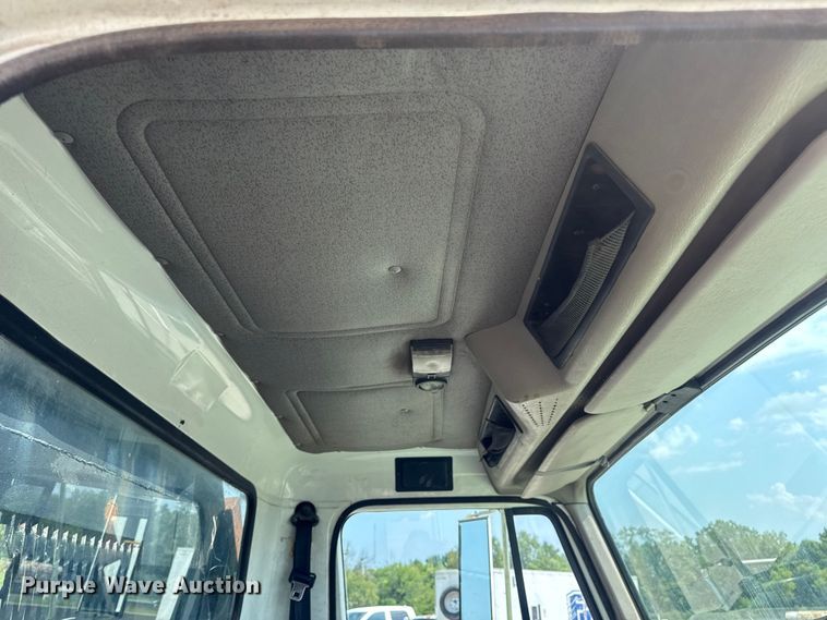 image for item DW6504 1999 International 4700  flatbed truck with crash attenuator