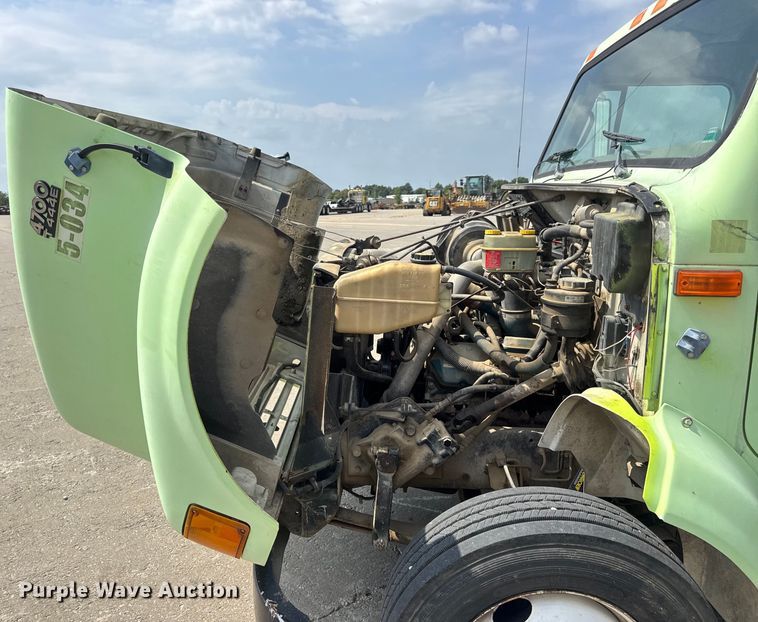 image for item DW6504 1999 International 4700  flatbed truck with crash attenuator