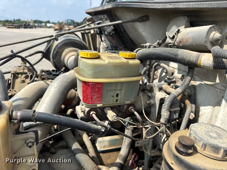 image for item DW6504 1999 International 4700  flatbed truck with crash attenuator