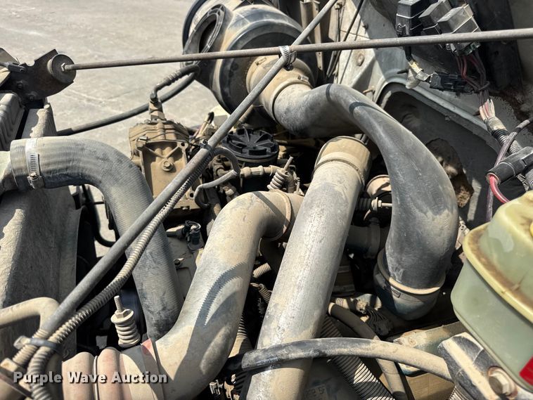 image for item DW6504 1999 International 4700  flatbed truck with crash attenuator