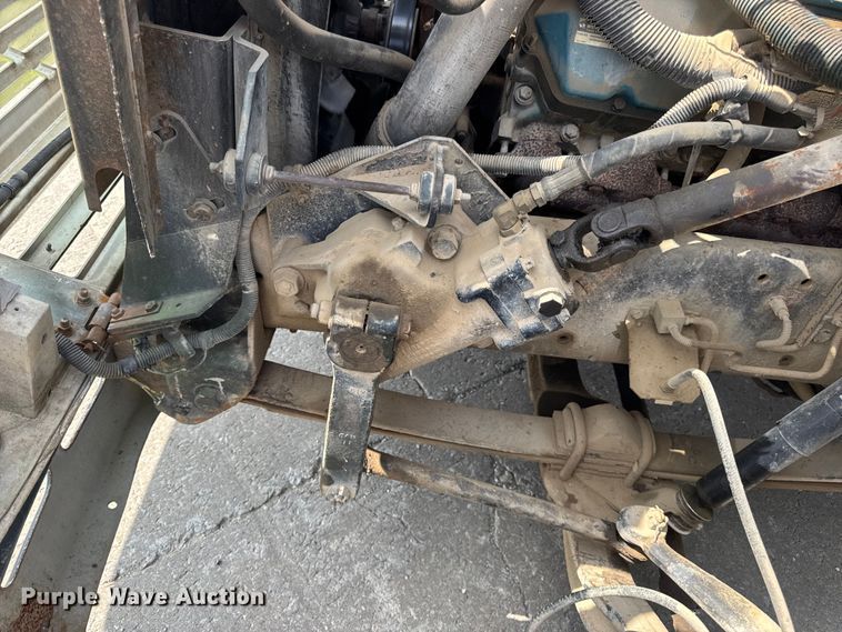 image for item DW6504 1999 International 4700  flatbed truck with crash attenuator