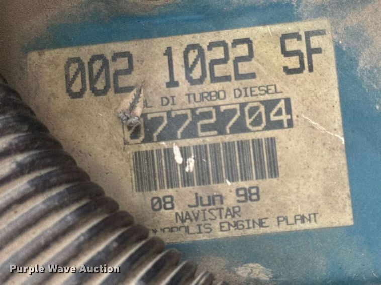 image for item DW6504 1999 International 4700  flatbed truck with crash attenuator