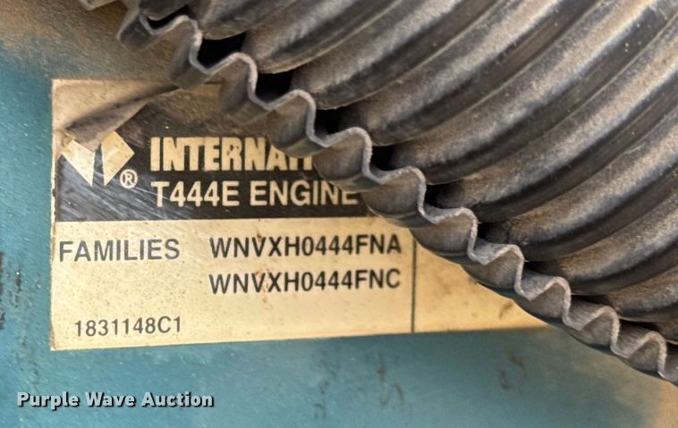 image for item DW6504 1999 International 4700  flatbed truck with crash attenuator