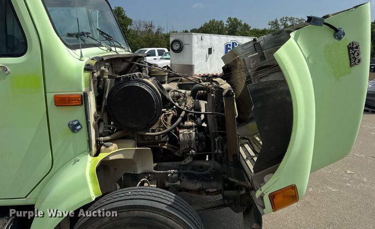 image for item DW6504 1999 International 4700  flatbed truck with crash attenuator