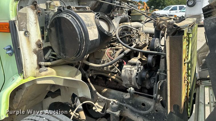 image for item DW6504 1999 International 4700  flatbed truck with crash attenuator