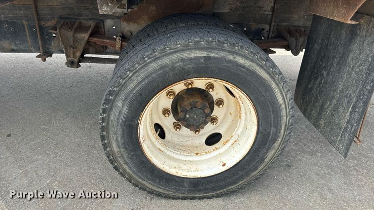 image for item DW6504 1999 International 4700  flatbed truck with crash attenuator