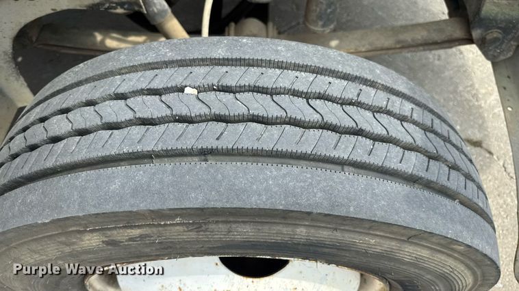 image for item DW6504 1999 International 4700  flatbed truck with crash attenuator