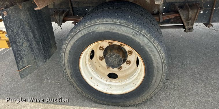 image for item DW6504 1999 International 4700  flatbed truck with crash attenuator