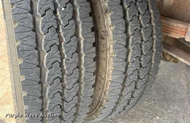 image for item DW6504 1999 International 4700  flatbed truck with crash attenuator