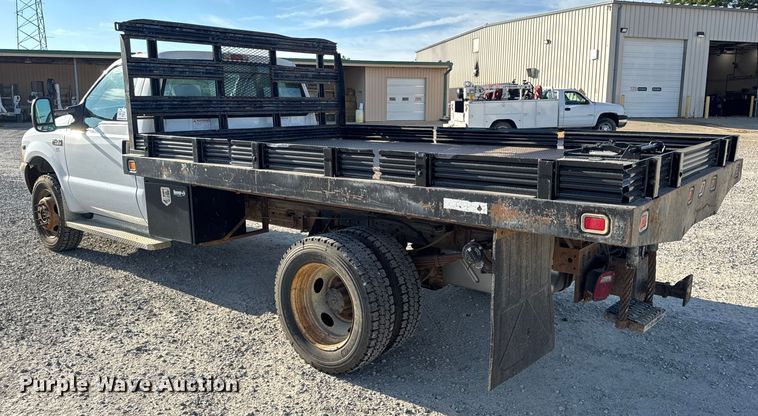 image for item DW6567 1999 Ford F450 Super Duty XL dump flatbed truck