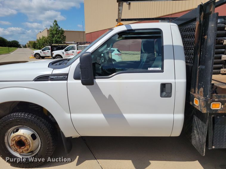 image for item DX7413 2013 Ford F350 Super Duty flatbed pickup truck