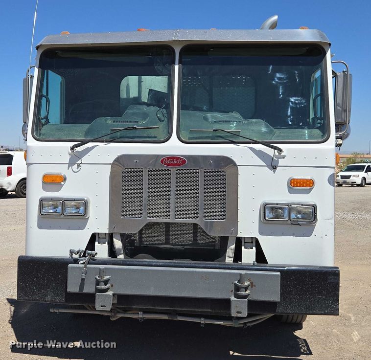 image for item EC1129 2013 Peterbilt 320 street sweeper truck