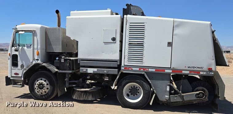 image for item EC1129 2013 Peterbilt 320 street sweeper truck